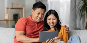 Asian couple on tablet